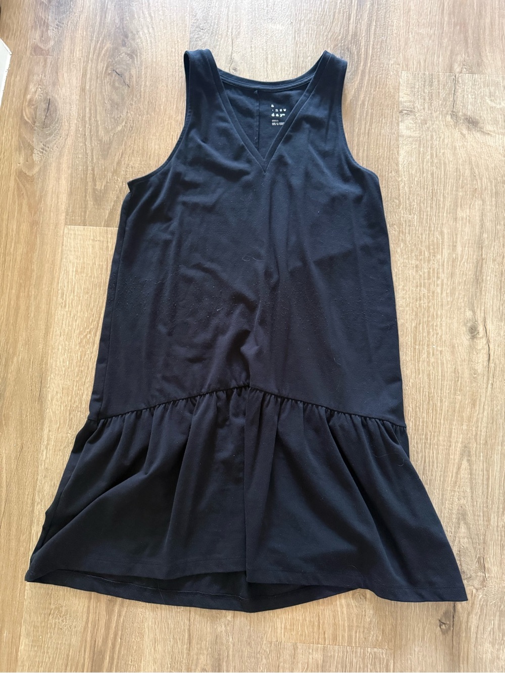 Black Sleeveless V-Neck Drop Waist Ruffle Hem Dress